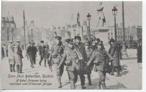A rebel prisoner being marched over O'Connell Bridge
